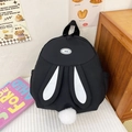 Cute black nylon backpack for students featuring white rabbit ears and a fluffy pom-pom tail - Black