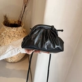 Minimalist black pleated cloud bag in shiny finish leather with a slim shoulder strap - Black