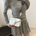 White lychee texture crossbody bag with fashion buckle and wide lettered strap - White