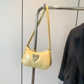 Pale yellow baguette shoulder bag with diamond-encrusted heart buckle and glossy finish - Yellow