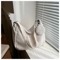 Detail of white corduroy tote bag with mini round pouch and adjustable strap under light - White With Mini Bag