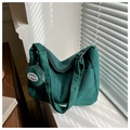 Detail of dark green corduroy shoulder bag showing texture and small matching pouch - Dark Green With Small Pouch