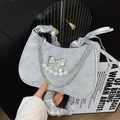 Silver satin crescent bag with metallic bow and pearl chain in futuristic style - Silver