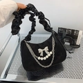 Black suede dumpling bag with silver bow, pearl chain and ruched handle detail - Black