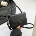 Minimalist black crossbody bag with golden buckle and adjustable strap - Black