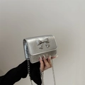 Mini silver chain bag with crinkled leather texture and a 3D butterfly bow decoration - Silver