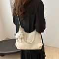 Minimalist cream shoulder bag with silver chain and white plush cloud charm accessory - White With Cloud Pendant
