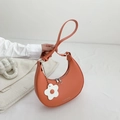 Orange crescent shoulder bag in plain PU leather with white flower charm and silver zipper - Orange