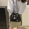 Mini black pleated bucket bag with bows and gold chain strap for women - Black