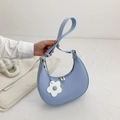Light blue crescent shoulder bag with silver chain and white floral charm detail - Blue