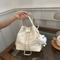 Chic beige PU leather bucket bag with silver chain drawstring and plush charm - White (With Glasses Pendant)