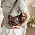 Dark brown retro crescent shoulder bag with a silver metal butterfly ornament - Brown