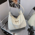 Minimalist beige moon bag with silver butterfly accent and adjustable chain strap - Off White