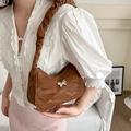 Brown vintage baguette bag with crinkled texture and silver butterfly ornament - Brown