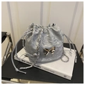 Detail of silver drawstring bucket bag with metal bow and elegant chain strap - Silver Without Pendant