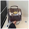 Mini zaino patchwork in ecopelliccia bicolore con cinturini in pelle vintage - Blu