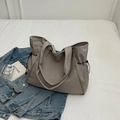 Minimalist grey nylon tote bag with functional drawstring detail and long shoulder straps - Light Gray