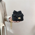 Mini bouclé tweed chain bag with ribbon bow and gold twist lock in black - Black