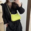 Neon green faux leather shoulder bag with a sleek gold buckle and knotted strap detail - Green
