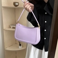 Minimalist lavender shoulder bag in smooth PU leather with elegant gold hardware buckles - Purple