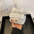 Chic multi-color tweed crossbody bag with oversized bow and golden chain strap - White