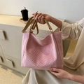 Borsa tote rosa con trama intrecciata, manici in pelle kaki e anelli dorati - Rosa