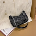 Glossy black quilted baguette bag with silver chain and chic rhombic stitching details - Black