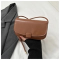 Modern brown PU leather square saddle bag with flap cover and thin shoulder strap - Tan