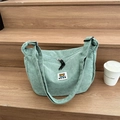 Mint green corduroy dumpling crossbody bag with cartoon bear embroidery and strap - Green