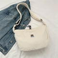 White corduroy crossbody bag featuring Mr Bear patch and adjustable shoulder strap - White