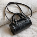 Mini borsa Boston cilindrica in pelle nera con finiture in argento e doppi manici corti - Nero