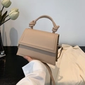 Bolso de mano nude estructurado con asa anudada y correa de hombro a juego - Caqui