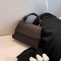 Dark brown knotted handle crossbody bag in smooth faux leather with a geometric shape - Brown