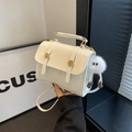 White minimalist square crossbody bag with gold stud details and cute plush charm - Beige with White Plush Charm