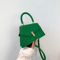 Emerald green geometric handbag with a semi-circular handle and gold clasp detail - Green