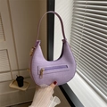 Purple crescent shoulder bag with woven texture and premium gold zipper detail - Purple