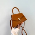 Caramel brown trapezoid handbag with gold metal lock and round top handle in faux leather - Brown