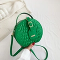Green crocodile pattern circular handbag with gold buckle and adjustable shoulder strap - Green