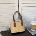 Natural straw woven tote bag with brown leather handles and drawstring lining for vacation - Brown