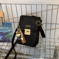 Black mini crossbody phone bag with quilted texture, gold clasp, and cute cow charm - Black With Tie Cow Pendant