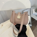 Beige leather underarm bag featuring a metallic gold buckle and fine stitching - Khaki