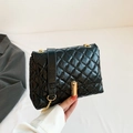 Glossy black quilted crossbody bag with golden rectangular clasp and elegant chain strap - Black