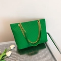 Vibrant green woven tote bag with gold chain strap for stylish daily commuting - Green