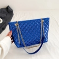 Metallic blue quilted tote bag with golden chain strap and luxury stitched texture - Blue