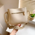 Minimalist beige PU leather bucket bag with wide vintage patterned jacquard strap - Beige
