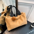 Brown plush tote bag with black webbing handles and a fluffy pom-pom charm - Khaki