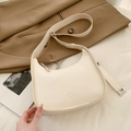 Schicke beige Satteltasche mit New York-Schriftzug und breitem, verstellbarem Schultergurt - Cremeweiß