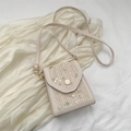 Chic cream woven mini crossbody bag featuring colorful flower embroidery and adjustable strap - White
