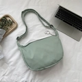 Minimalist light green corduroy crossbody bag with adjustable strap and cute lamb tag - Green