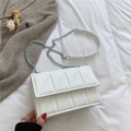 Chic white quilted crossbody bag featuring elegant diamond stitching and chain strap - White